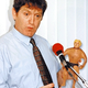 Consumer Product Safety Commission head David Arnell holds one of the hazardous, way-cool dolls.
